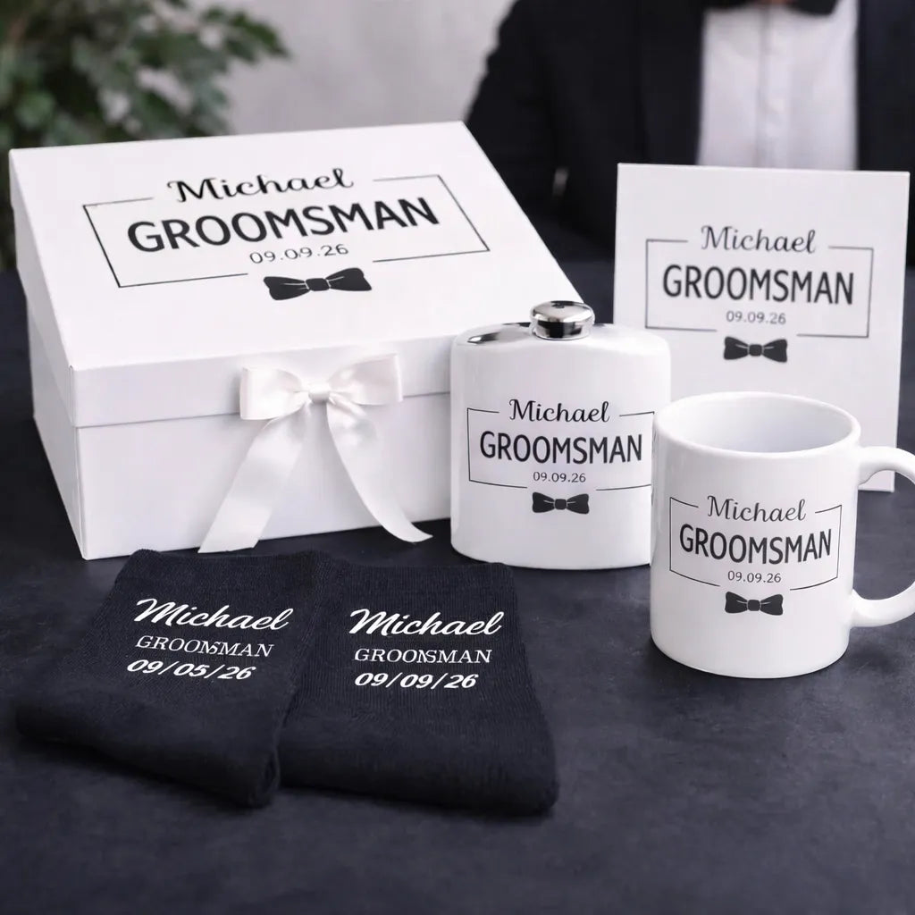 Groomsmen gift set with personalized mug, flask, and socks in a box.