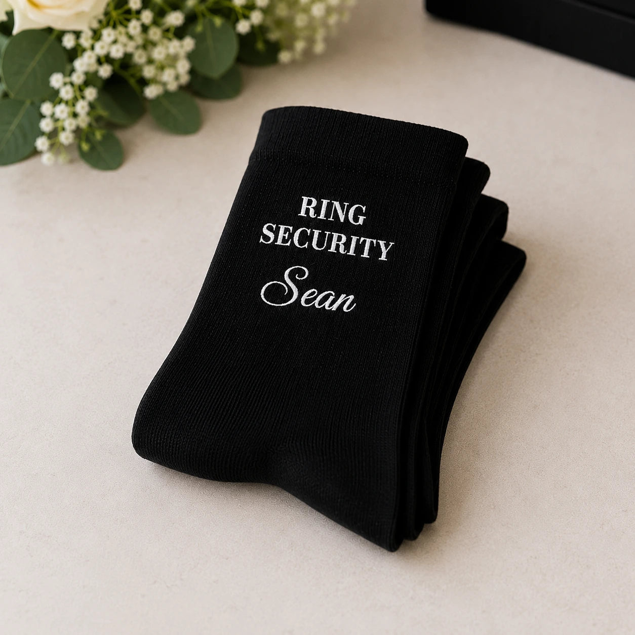 Personalised black ring security socks embroidered with child's name for page boys and ring bearers