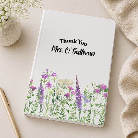 Personalised white A5 lined teacher notebook with floral design and custom teacher name printed in Ireland