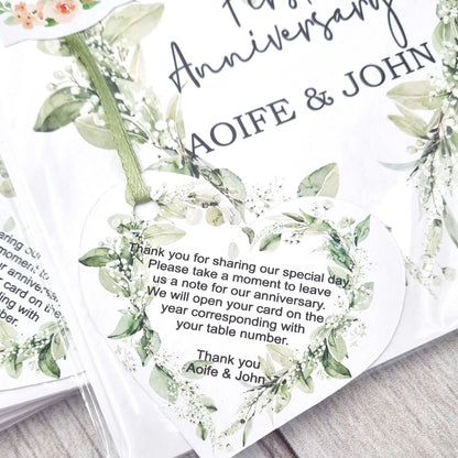 Close-up of personalised wedding anniversary table card heart message tag with eucalyptus greenery design, custom names Aoife and John – Irish wedding keepsake by HanaLee Studios