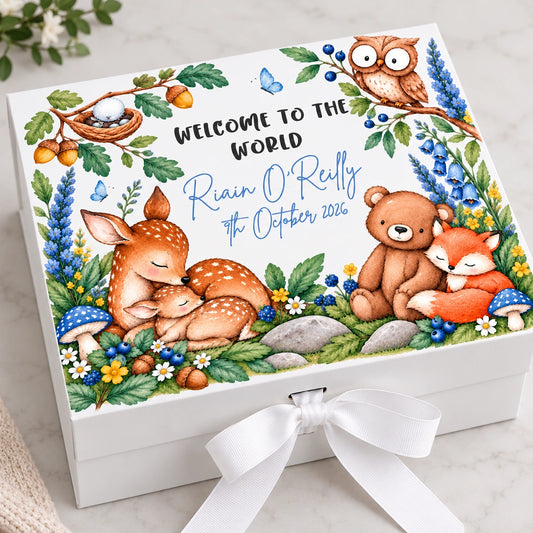 White personalised baby keepsake box with blue woodland animal design featuring deer, fox, bear and owl, baby's name and birth details.