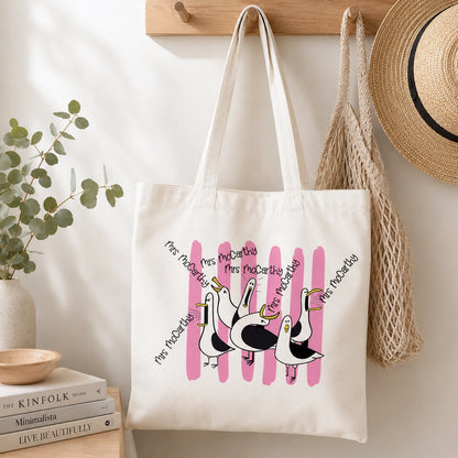 Pink design teachers canvas tote bag with image of seagulls and personalised with teachers name