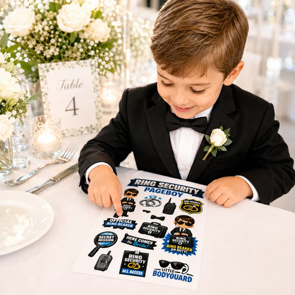 Young page boy sitting at a wedding table using a Ring Security page boy sticker sheet activity pack.
