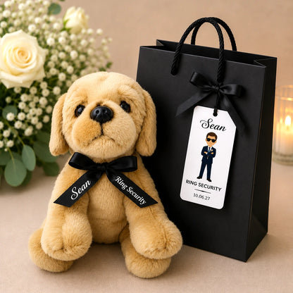 Soft teddy bear with personalised Ring Security ribbon beside matching gift bag, card and tag for page boy wedding gift