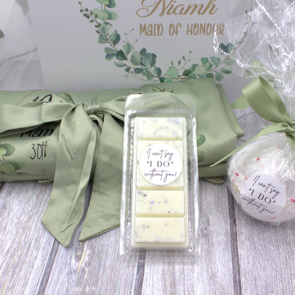 Heavenly scent gift set with white personalised luxury gift box with eucalyptus wreath design and matching sage green robe, bath bomb and wax melt. 