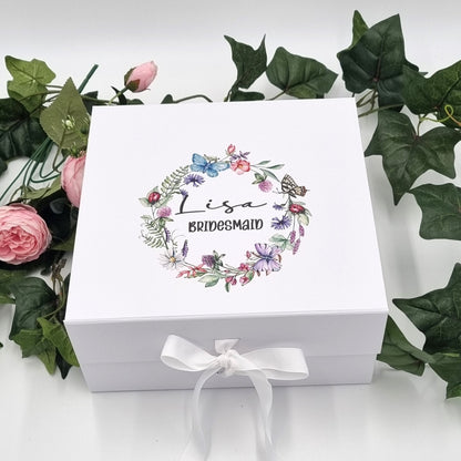 White luxury gift box with butterfly wreath design and name and title