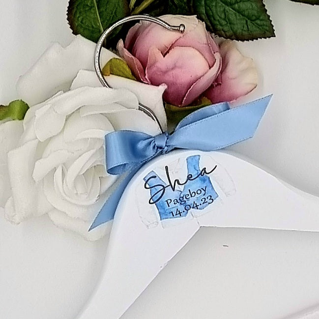 Pageboy white hanger with image of navy blue suit with blue ribbon and personaised with name date and title 