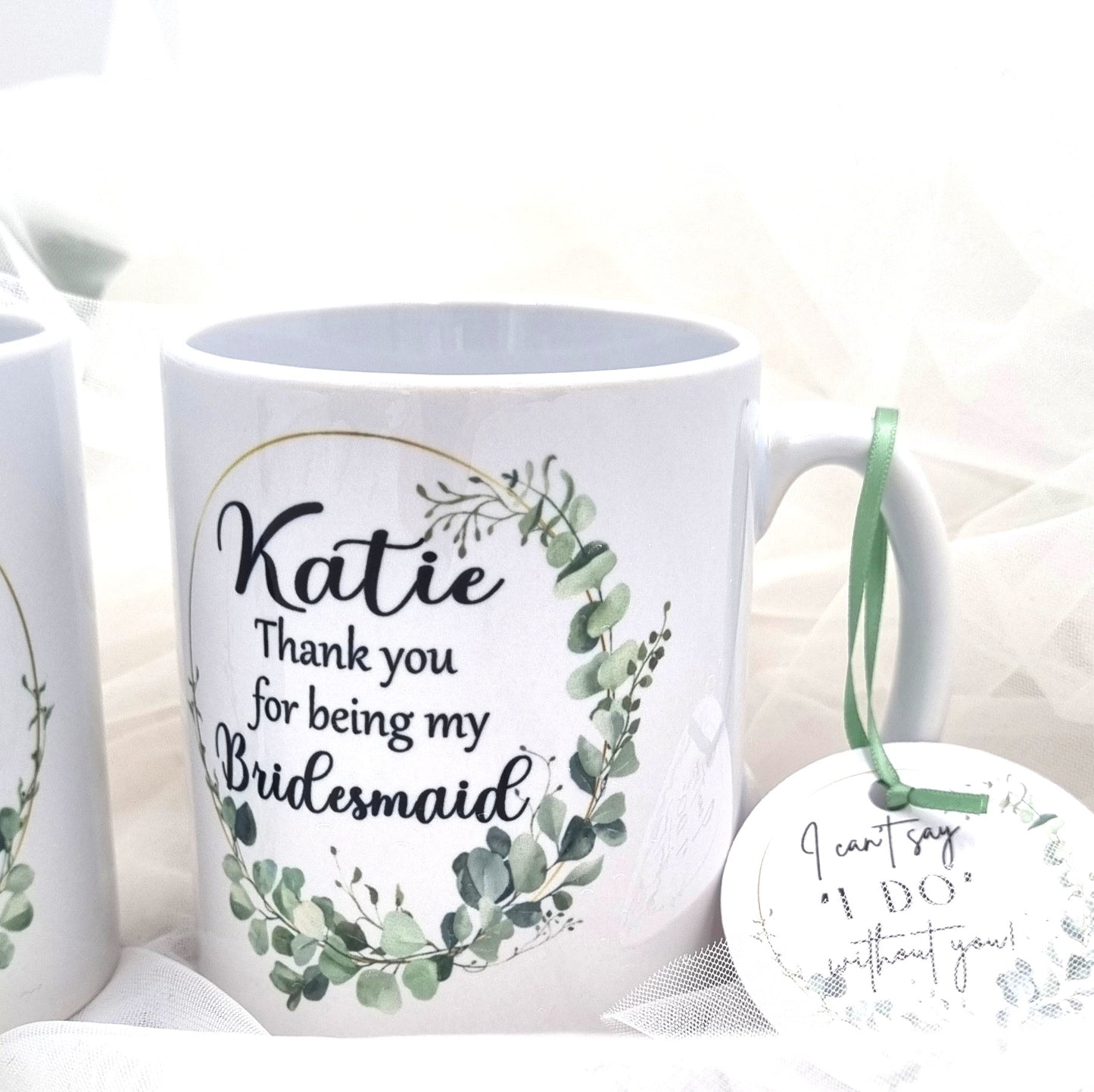 HanaLee's personalised bridesmaid or maif of honour mug with image of bride and bridesmaid. These are personalised with the name and hair colour. 