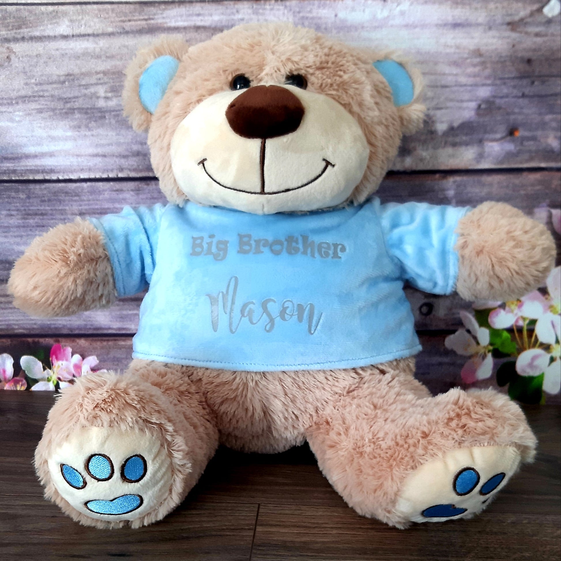 large personalised t shirt teddy bear with blue or pink t shirt. Persoanlised with child's name or can be done with a message such as flowergirl or pageboy proposals. 