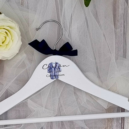 Custom First Communion hanger showing personalised name, date and satin bow detail in pink or navy, perfect Irish personalised child’s gift