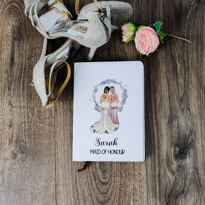 HanaLee's personalised A5 white notebook with image of bride and bridesmaid and name of bridesmaid under the design. 