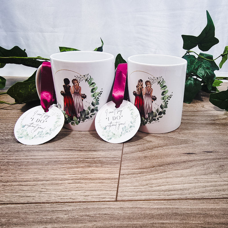 HanaLee's personalised bridesmaid or maif of honour mug with image of bride and bridesmaid. These are personalised with the name and hair colour. 