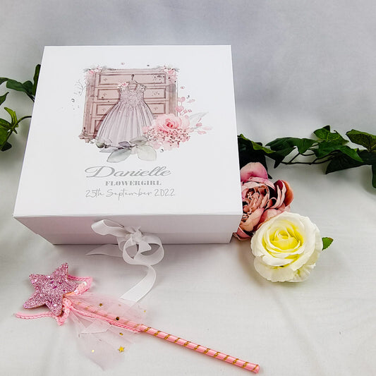 White luxury gift box with pink image of flowergirl dress and pink roses and personalised with name, date and title. 