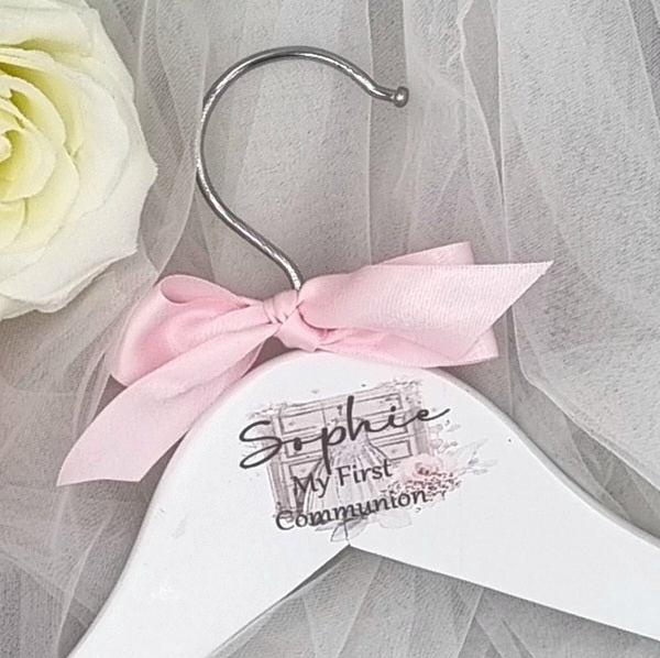 Personalised First Communion clothes hanger with child’s name and date, white wooden hanger with navy or pink bow, Irish made keepsake gift