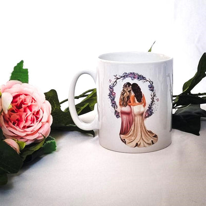HanaLee's personalised bridesmaid or maif of honour mug with image of bride and bridesmaid. These are personalised with the name and hair colour. 