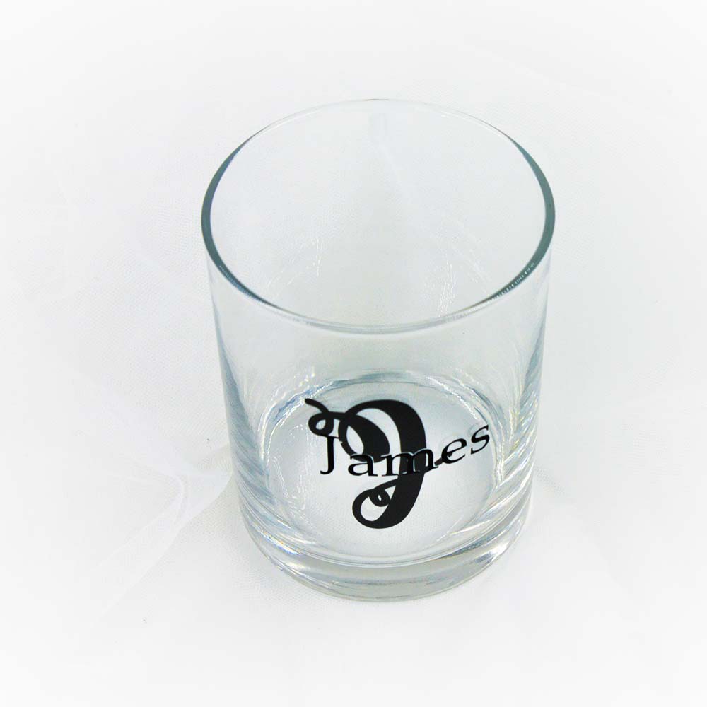 Wedding whiskey tumblers for groom with large charcoal colour initial and name in black